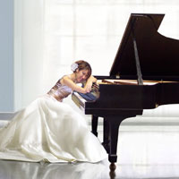 Studio Photo of Christine Mari Yoshikawa at a piano